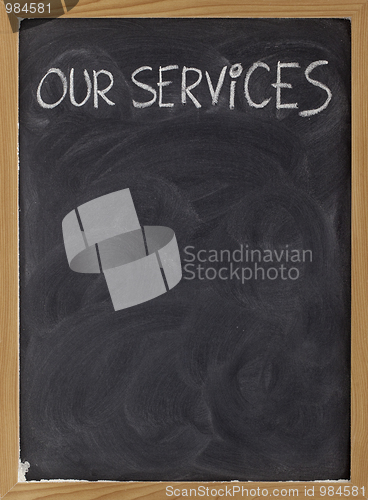 Image of our services blackboard sign