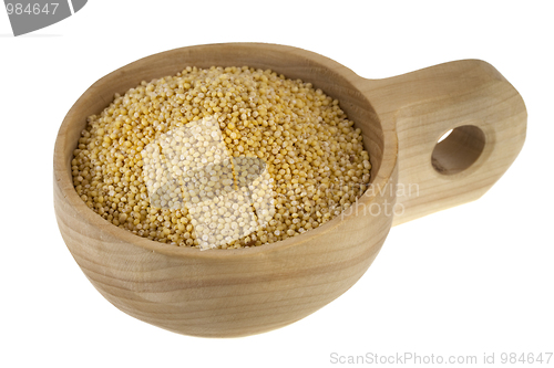 Image of scoop of hulled millet grain