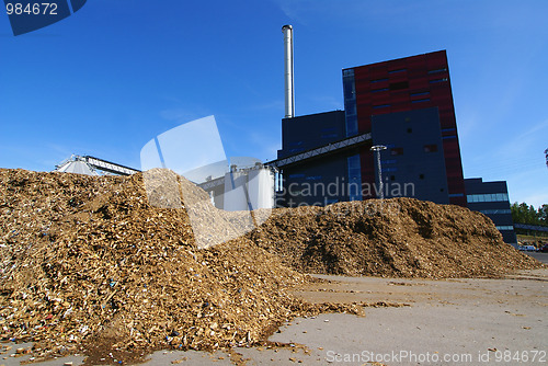 Image of bio power plant with storage of wooden fuel 