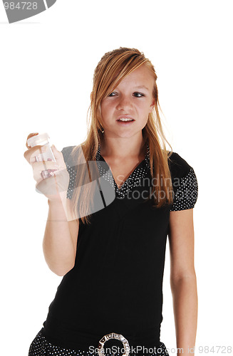 Image of Girl not liking pills.