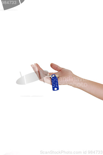 Image of A hand with a key.