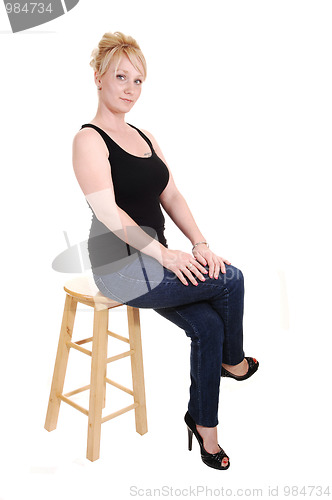 Image of Blond girl in jeans.