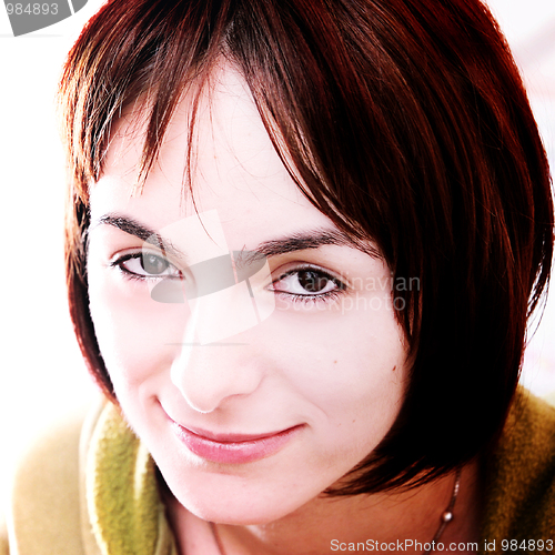 Image of Young woman in bed