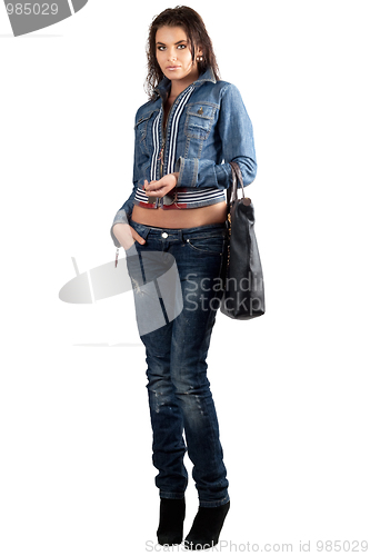 Image of Beautiful young woman in a denim suit