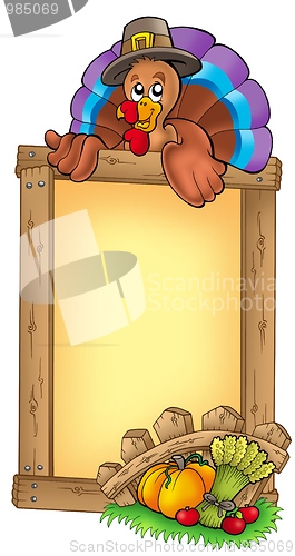 Image of Wooden frame with lurking turkey
