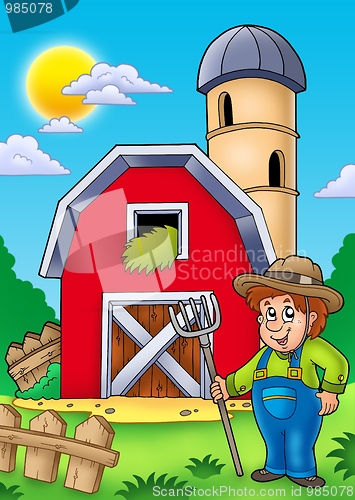 Image of Big red barn with farmer