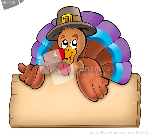 Image of Wooden board with lurking turkey