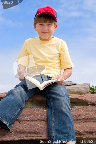 Image of Sitting Boy with Book