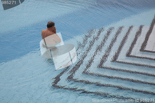 Image of Standing in the pool