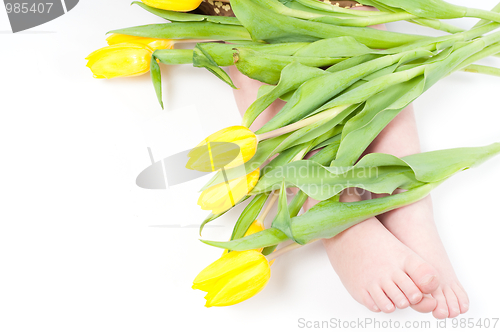 Image of Little girl foots with flowers
