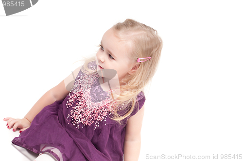 Image of Studio shot of baby girl in gala dress