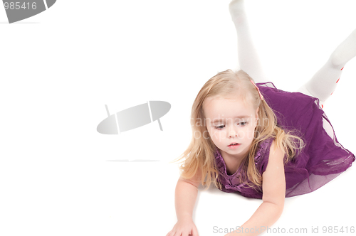 Image of Studio shot of baby girl in gala dress