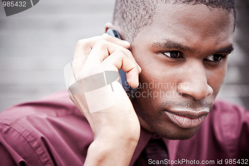 Image of Black businessman on the phone