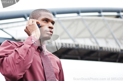 Image of Black businessman on the phone
