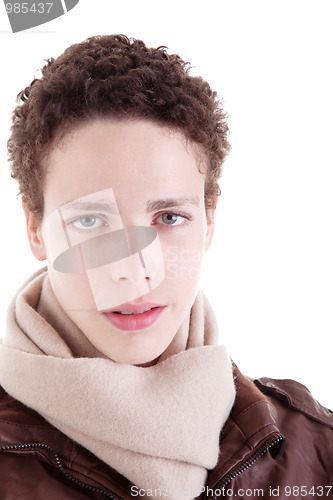 Image of portrait of a serious young man, with winter clothes