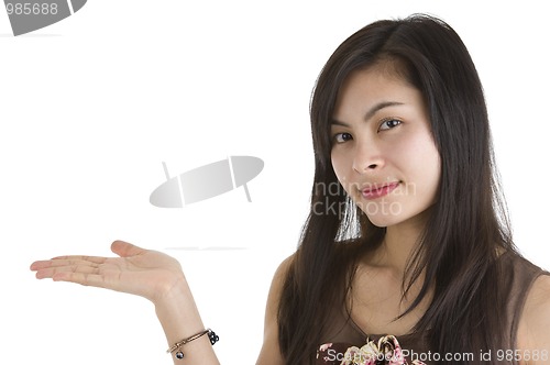 Image of woman presenting something