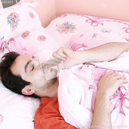 Image of Young man sleeping .