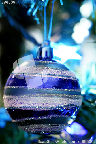 Image of Christmas ornaments on tree.