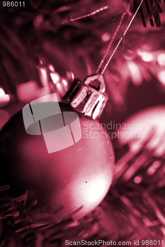 Image of Christmas ornaments on tree.