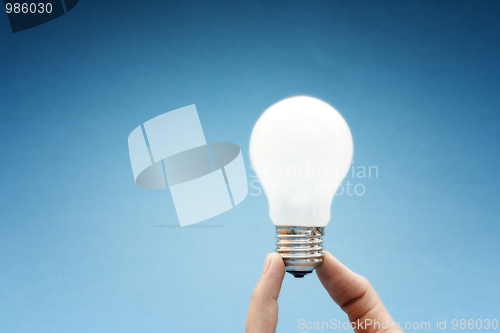 Image of Background with lit lightbulb