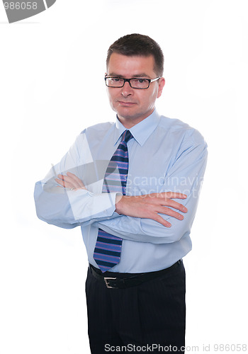Image of Businessman looks seriously at camera