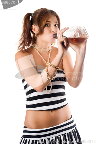 Image of Sexy young woman drinking whiskey