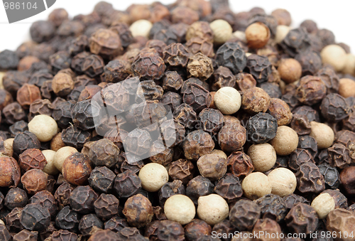 Image of Heap of black and white pepper