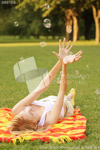 Image of Woman and soap bubbles