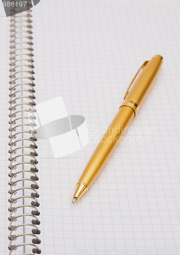 Image of Notepad and pen 