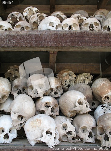 Image of Human skulls fill memorial stupa at Choeung Ek, Cambodia