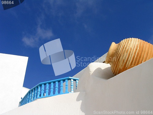 Image of Vase set in whitewashed wall, Santorini, Greece