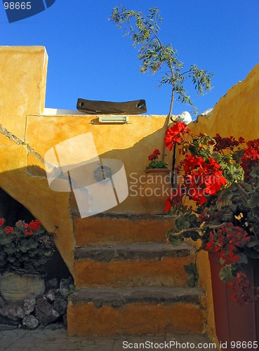 Image of Colorful orange stairs. Santorini, Greece