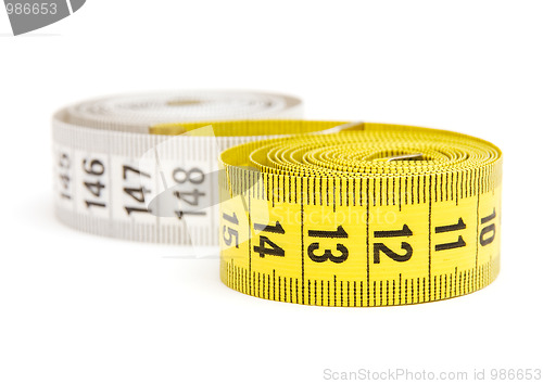 Image of Yellow and white measuring tape