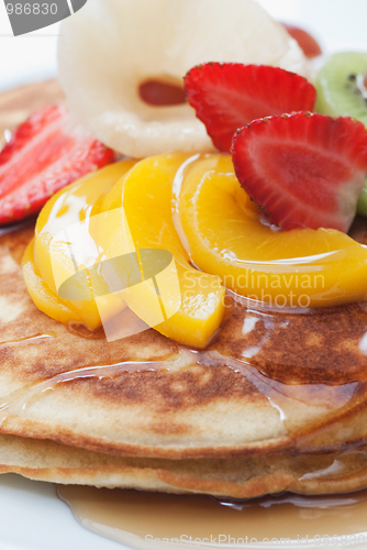 Image of Pancakes with fruit on top