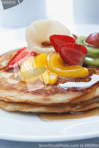 Image of Pancakes with fruit on top