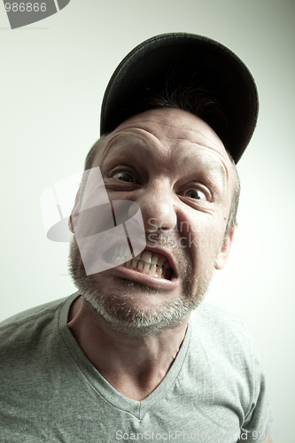 Image of expresive man doing a funny face