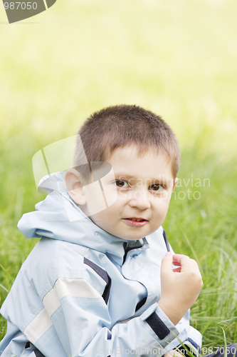 Image of Cute little kid in grass
