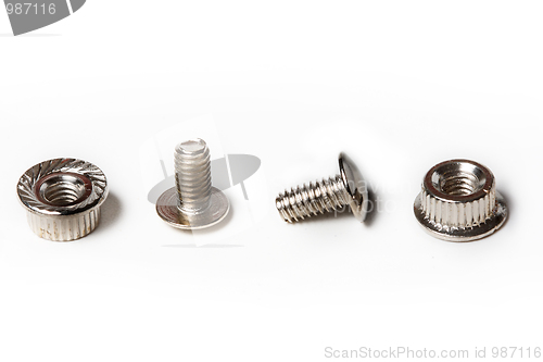 Image of Many screws and nuts isolated on white background