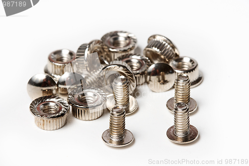 Image of Many screws and nuts isolated on white background