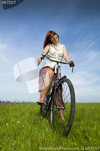 Image of Girl with a bicycle