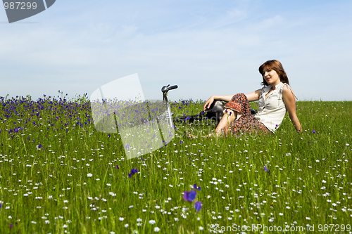 Image of Girl with a bicycle