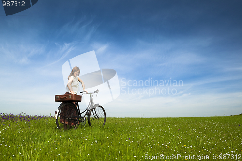 Image of Girl with a bicycle