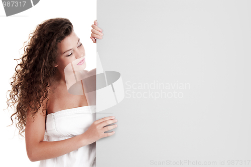 Image of Girl with a white billboard