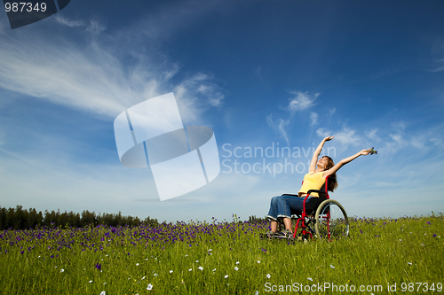 Image of Handicapped woman on wheelchair