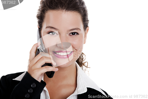 Image of Businesswoman talking on phone