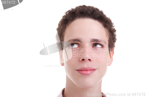 Image of handsome young man smiling and looking up 