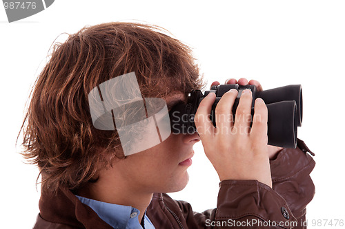 Image of Young boy looking through binoculars