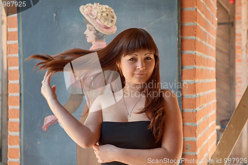 Image of Beauty red-haired girl.