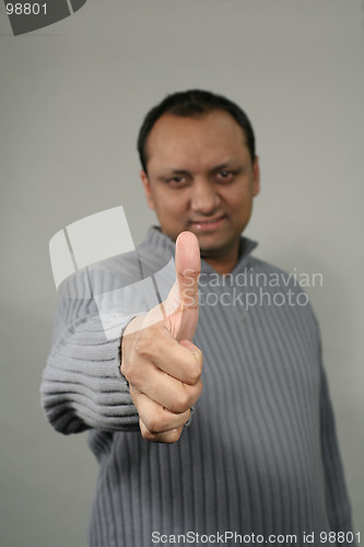 Image of man doing thumbs up