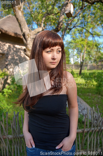 Image of Beauty girl in farmstead.